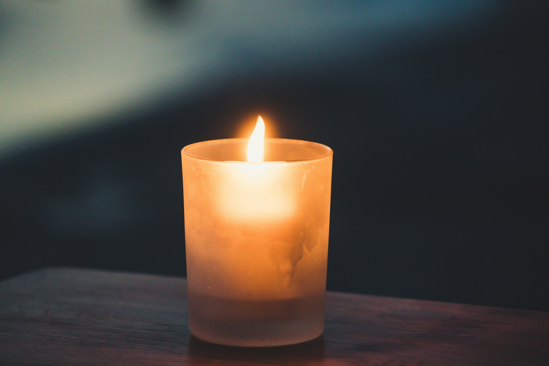 CBD Candles Benefits | Calmly Rooted A lit candle on a table