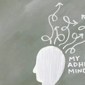 Tired but Wired? Why You Can’t Sleep & How to Fix It | Calmly Rooted Chalk-style illustration of a head with chaotic, tangled arrows representing a restless, racing mind and the feeling of being tired but wired.
