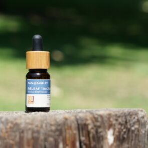 A blue labeled bottle